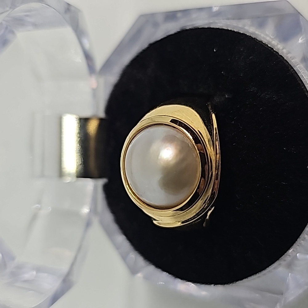 14k mabe pearl ring, 6.9 grams, size 7, 10.64mm pearl.